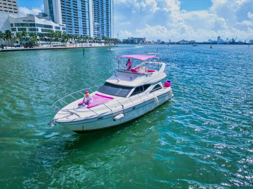 50ft Pink Maxum Bad Bunny themed Miami yacht rental