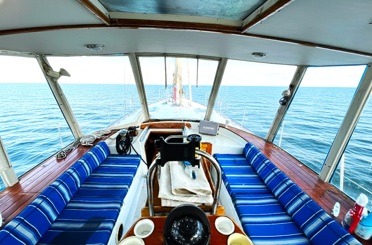 Wide cockpit view looking forward to the bow