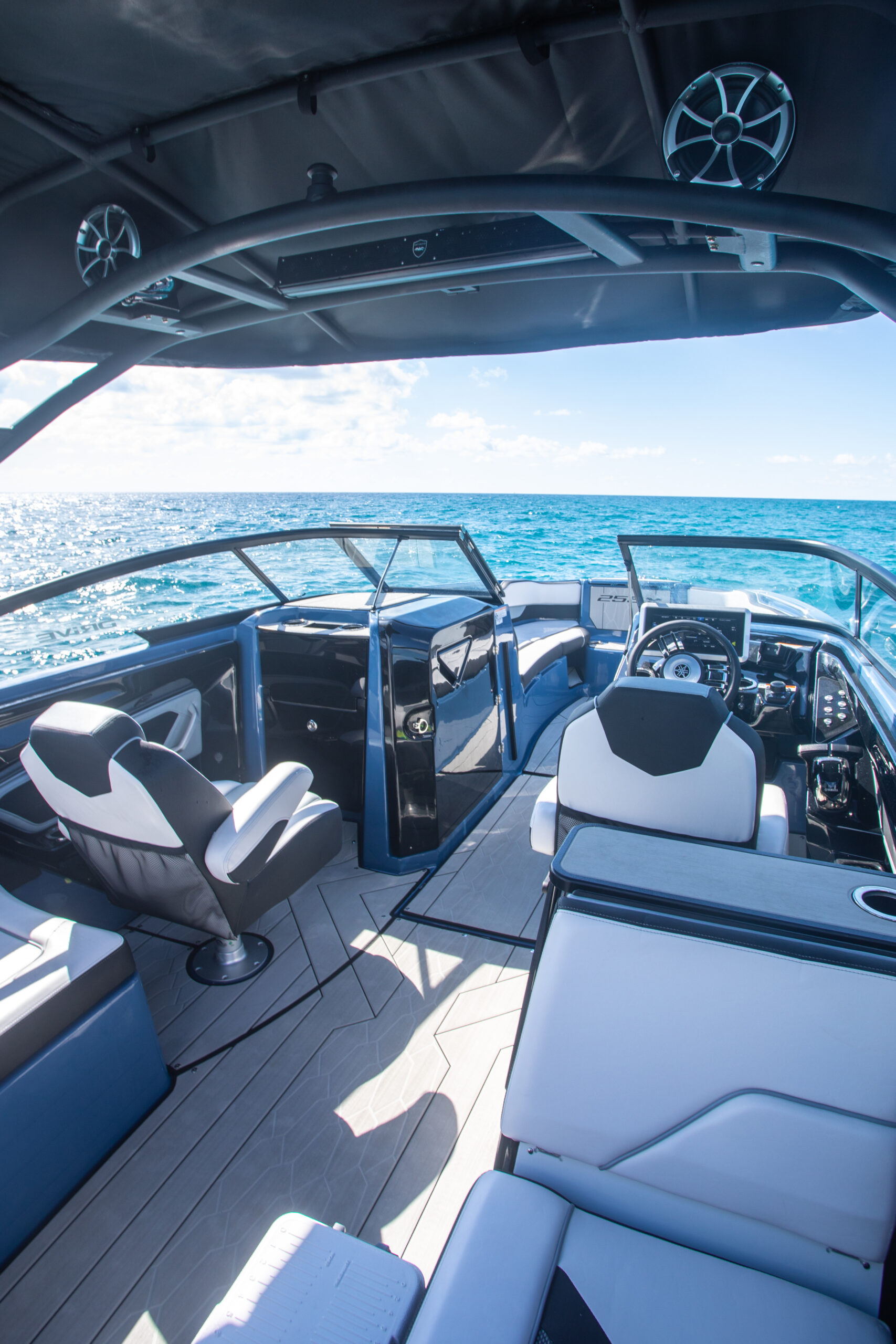 Stylish interior layout of wakeboard boats in Miami with cushioned seating